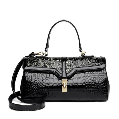 Schwarze Lederhandtasche mit Blumenmuster, Krokodilprägung, goldener Verschluss, Damenmode.