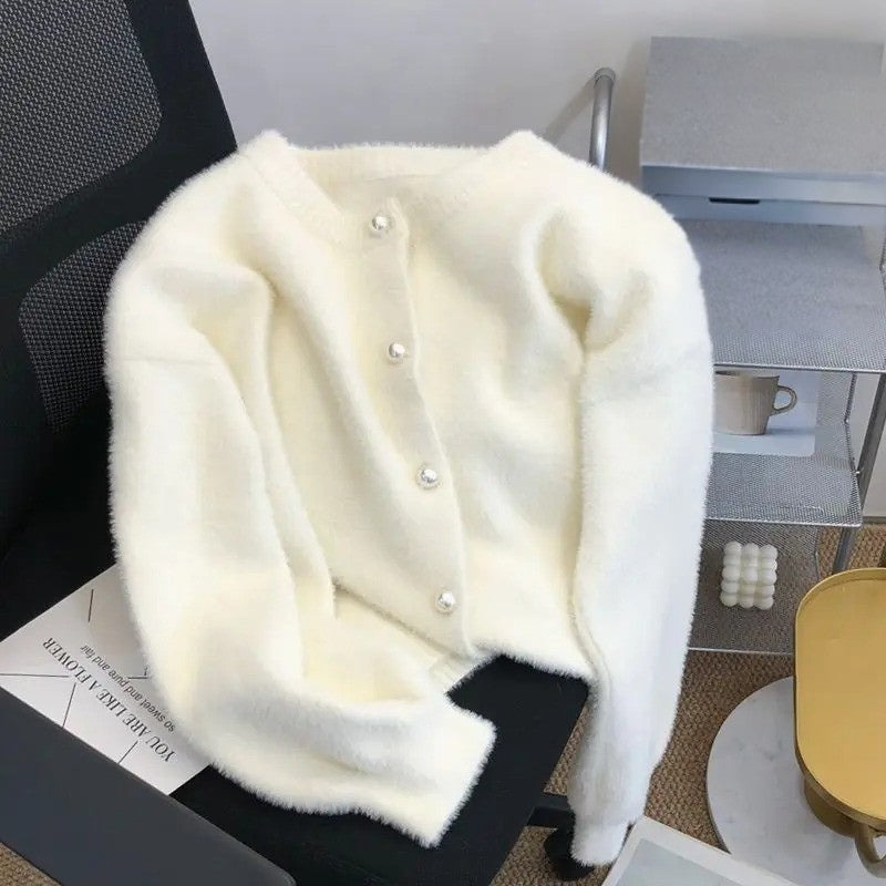 Löst stickad damväst med rund halsringning - Sophie
