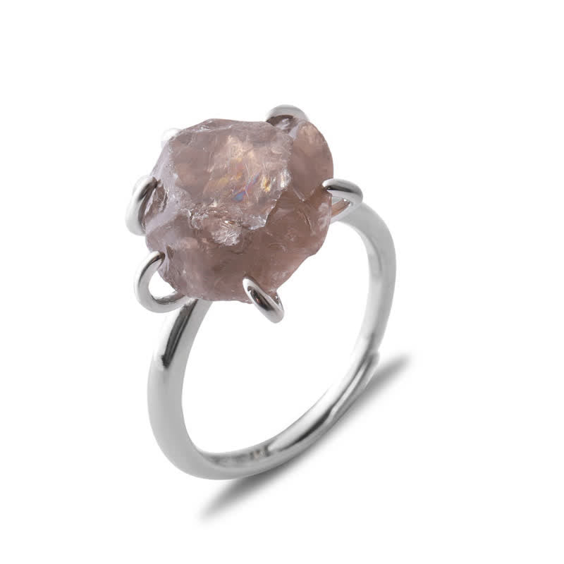 Silberring mit rohem Rosenquarz, eleganter Schmuck, handgefertigt, einzigartiges Design.