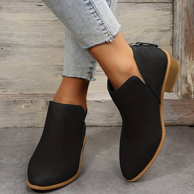 Schwarze Damen-Stiefeletten aus Leder mit Holzabsatz, modisch, bequem, ideal für Herbst.