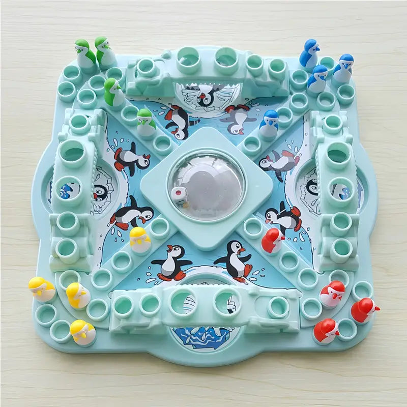 Brettspiel mit Pinguinfiguren, blau, Kunststoff, Kinderspiel, Spaß, Gesellschaftsspiel.