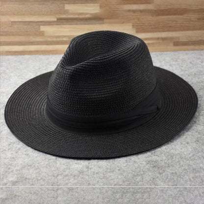 Schwarzer Fedora-Hut aus Stroh, elegantes Design, ideal für Sommermode und Sonnenschutz.