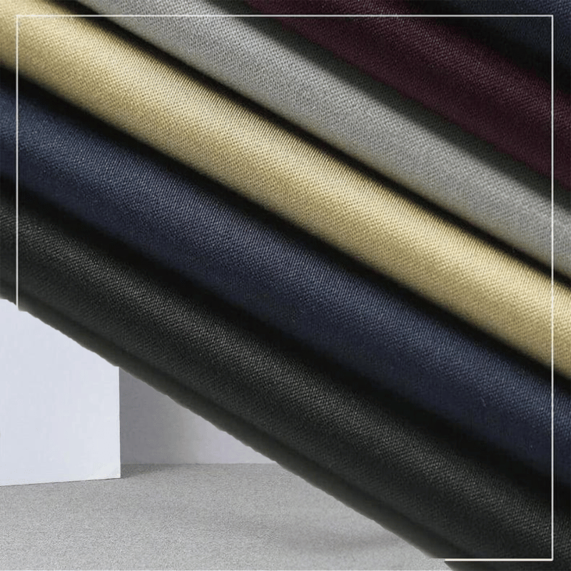Mehrfarbiger Stoffstapel, Textilien, Baumwolle, verschiedene Farben, hochwertige Materialien