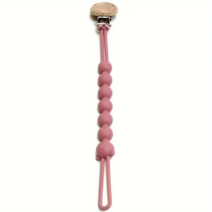 Rosa Silikon Schnullerkette mit Holzclip, Baby Zubehör, BPA-frei, langlebig und sicher.