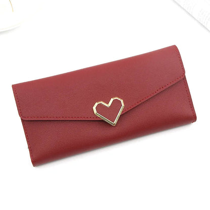 Rote Damen-Geldbörse aus Leder mit Herzverschluss, elegantes Design, modisches Accessoire.
