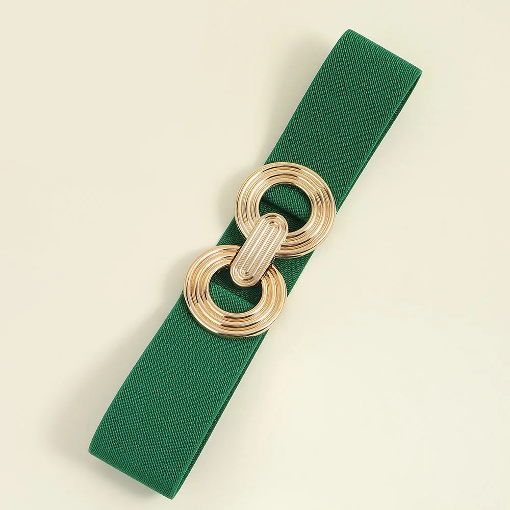 Grüner elastischer Gürtel mit goldener Schnalle, modisches Accessoire für Damen.