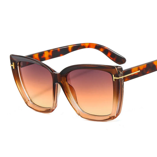 Stiliga cat-eye-solglasögon med UV-skydd och gradienttoning - VueLuxe