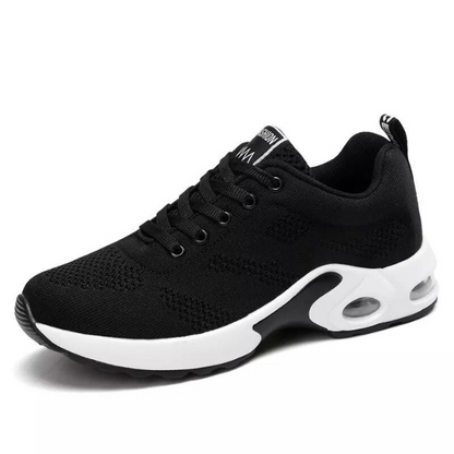 Schwarzer Sportschuh, atmungsaktiv, mit weißer Sohle, ideal für Laufen und Fitness.