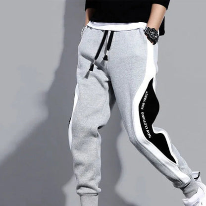 Höstliga herrpatchwork-joggers med dragsko – Rafael