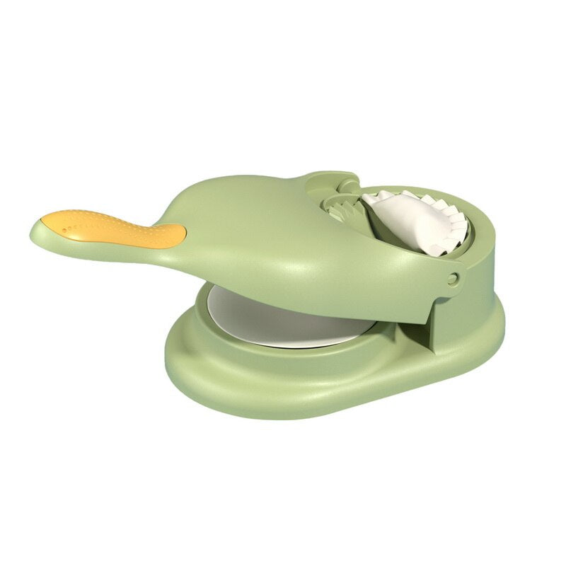 Grüner Teigformer aus Kunststoff, ergonomischer Griff, ideal für Ravioli und Teigtaschen.