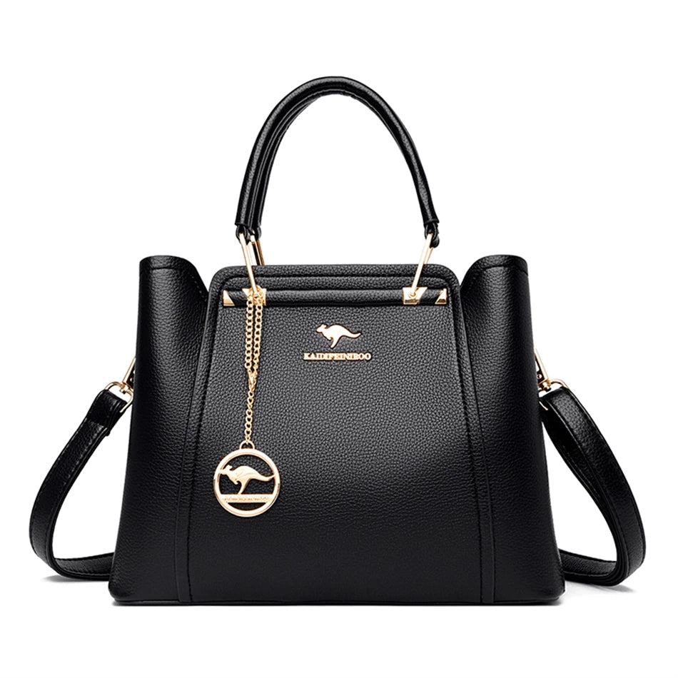 Schwarze Lederhandtasche mit goldenen Details, elegantes Design, Damenmode Accessoire.