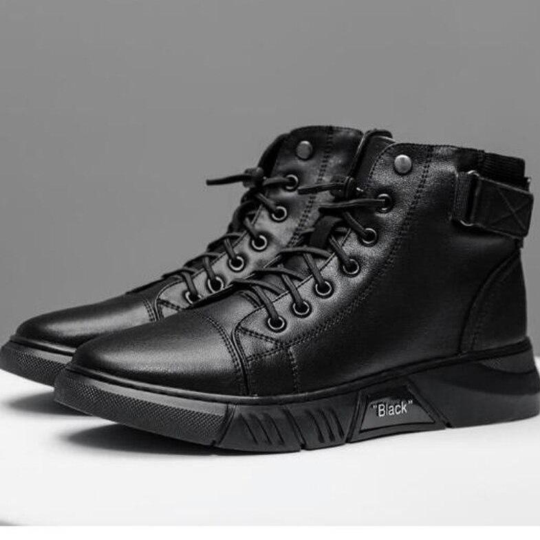 Schwarze Herren-Sneaker aus Leder, hohe Knöchel, modisches Design, robuste Sohle.