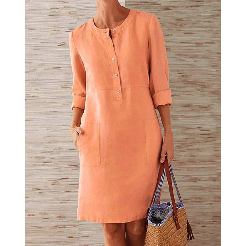 Höstig, stilfull damfritidsklänning med fickor och rund halsringning – Niva