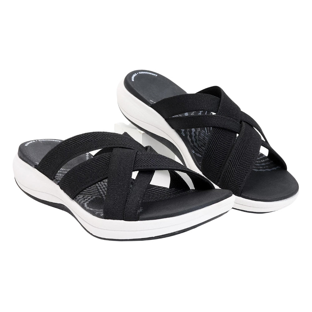 Schwarze Damen-Sandalen mit Kreuzriemen, bequeme Sohle, ideal für Sommermode.