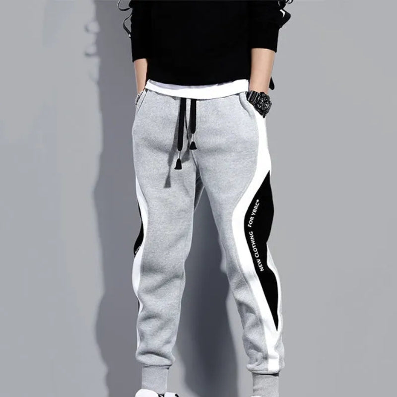 Höstliga herrpatchwork-joggers med dragsko – Rafael