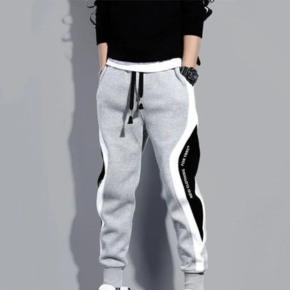 Höstliga herrpatchwork-joggers med dragsko – Rafael