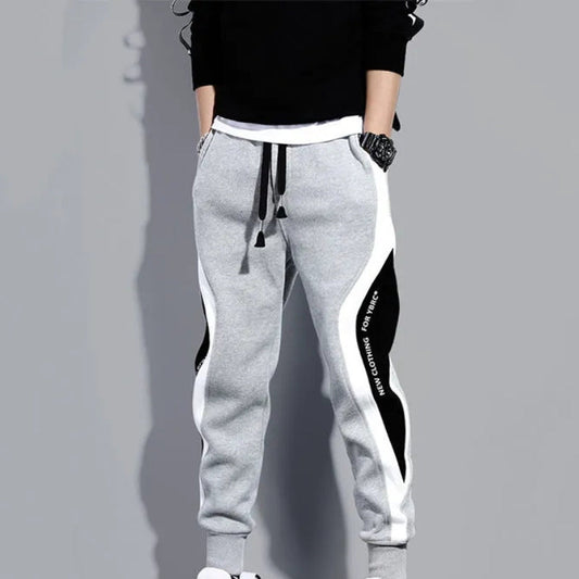 Höstliga herrpatchwork-joggers med dragsko – Rafael