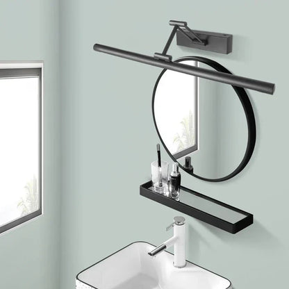 Runder schwarzer Wandspiegel mit Ablage und LED-Licht über modernem Waschbecken im Badezimmer.