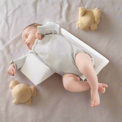 Antirullande justerbar babykudde – Cudlo