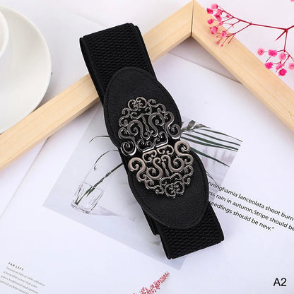 Schwarzer elastischer Gürtel mit silberner Schnalle, Damenmode-Accessoire, elegant und stilvoll.