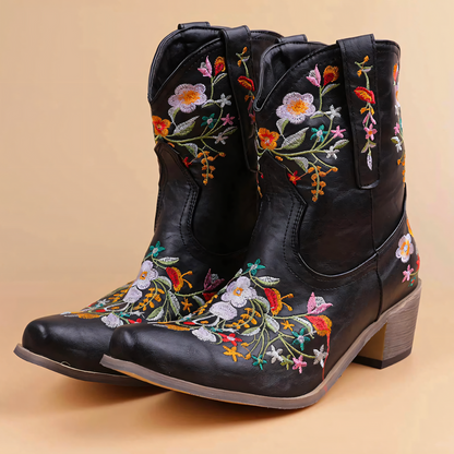 Schwarze Cowboystiefel mit bunter Blumenstickerei, Leder, Damenmode, Westernstil.