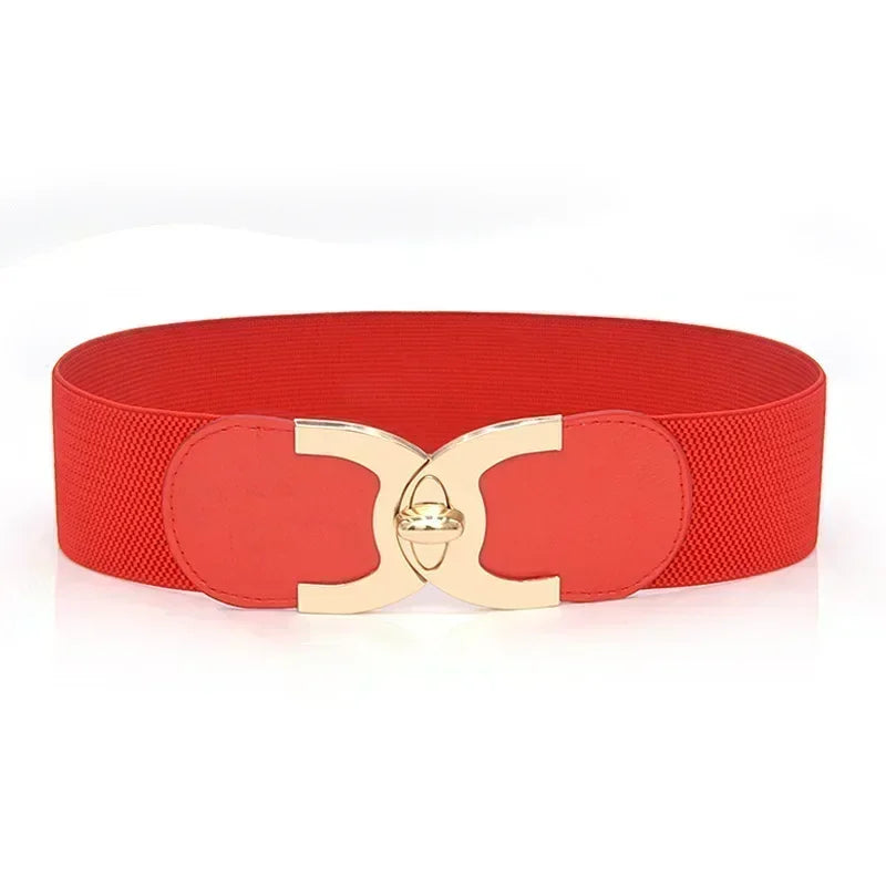 Roter elastischer Gürtel mit goldener Schnalle, modisches Accessoire für Damenmode.