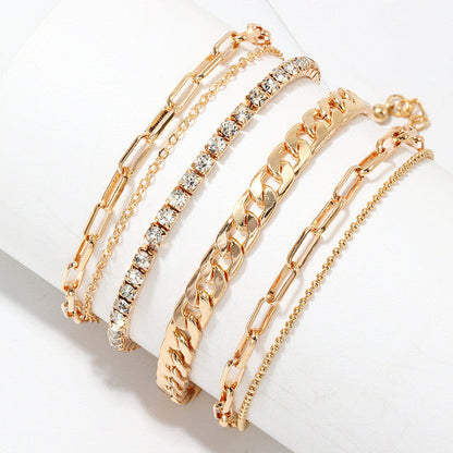 5-teiliges goldfarbenes Fußkettchen-Set mit Perlen und Schlangenketten für Damen.