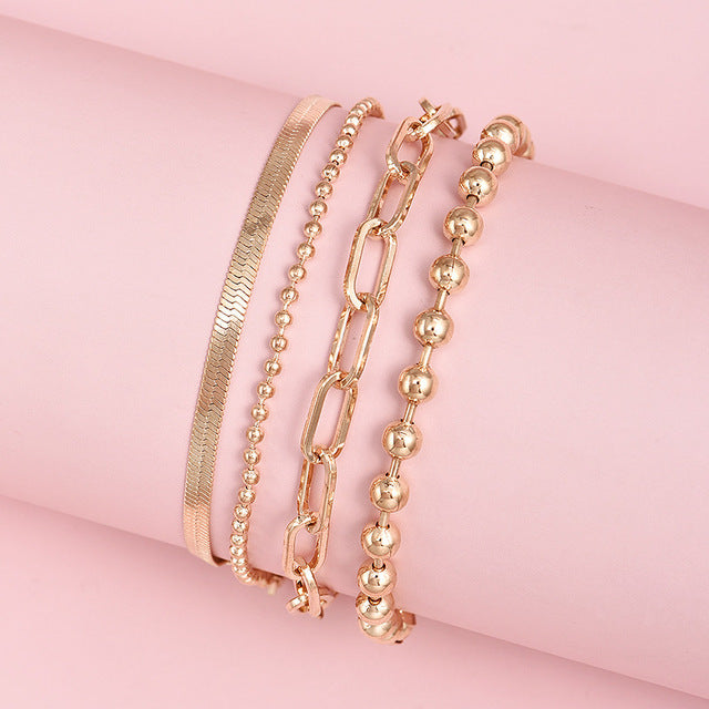 5-teiliges Set goldene Fußkettchen, mehrlagig, Perlen- und Schlangenkette, Damen-Schmuck.