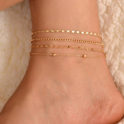 Goldene mehrschichtige Fußkettchen-Set für Damen, modische Schmuckaccessoires.
