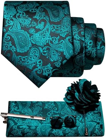 Turkosgrönt paisleyslips med svart botten, bröstnäsduk, manschettknappar, slipsklämma och blomformad kavajnål. 25