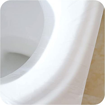Weiße Toilettensitzauflage aus Papier, hygienisch, Einweg, für öffentliche Toiletten.