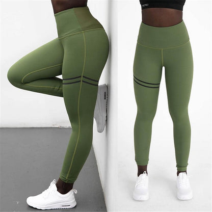 Grüne Damen-Sportleggings, hoch tailliert, mit schwarzen Streifen, ideal für Fitness und Yoga.