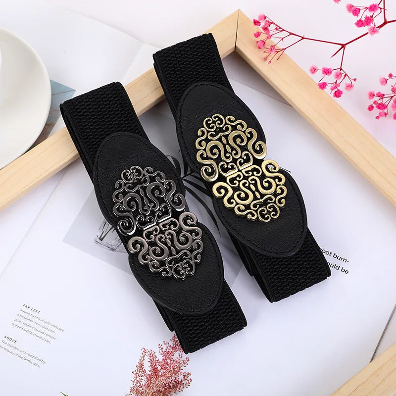 Schwarzer elastischer Gürtel mit goldener und silberner Schnalle, Damenmode Accessoire.