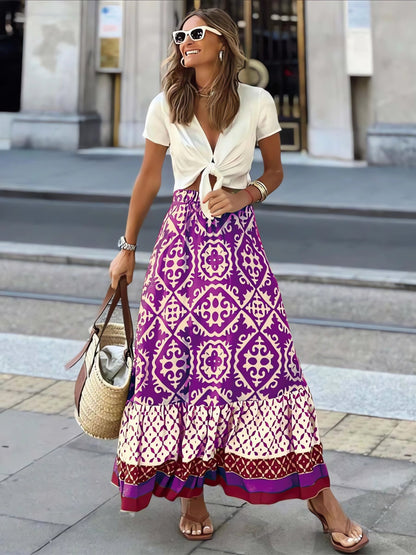 Mönstrad Boho Maxikjol med flytande silhuett och fransar – Yalina