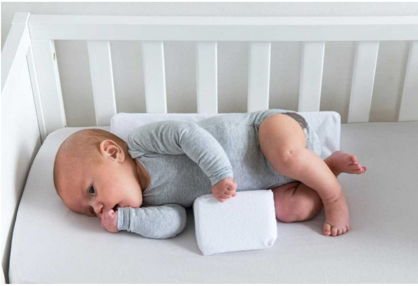 Antirullande justerbar babykudde – Cudlo
