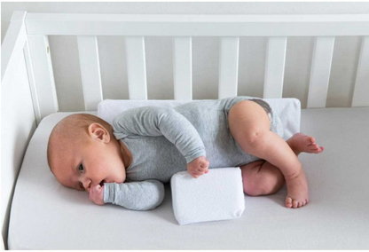 Antirullande justerbar babykudde – Cudlo