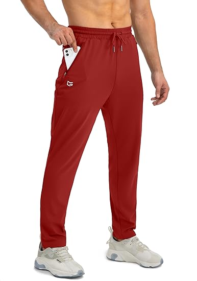 Mann in roten Jogginghosen mit Smartphone-Tasche, Sportbekleidung, bequem, atmungsaktiv.