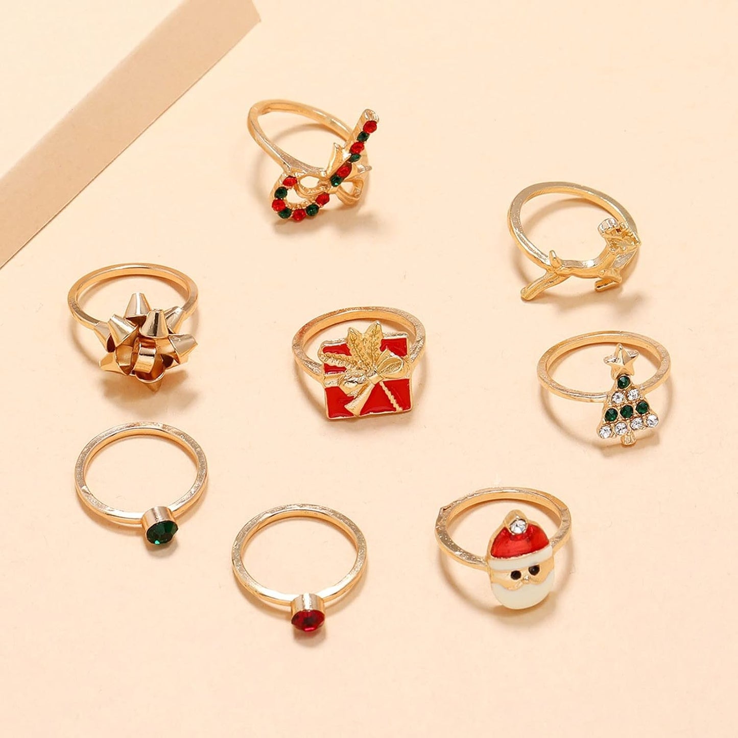 Weihnachtliche Ringe Set, goldfarben, mit Weihnachtsbaum, Rentier, Geschenk, Santa-Motiv.