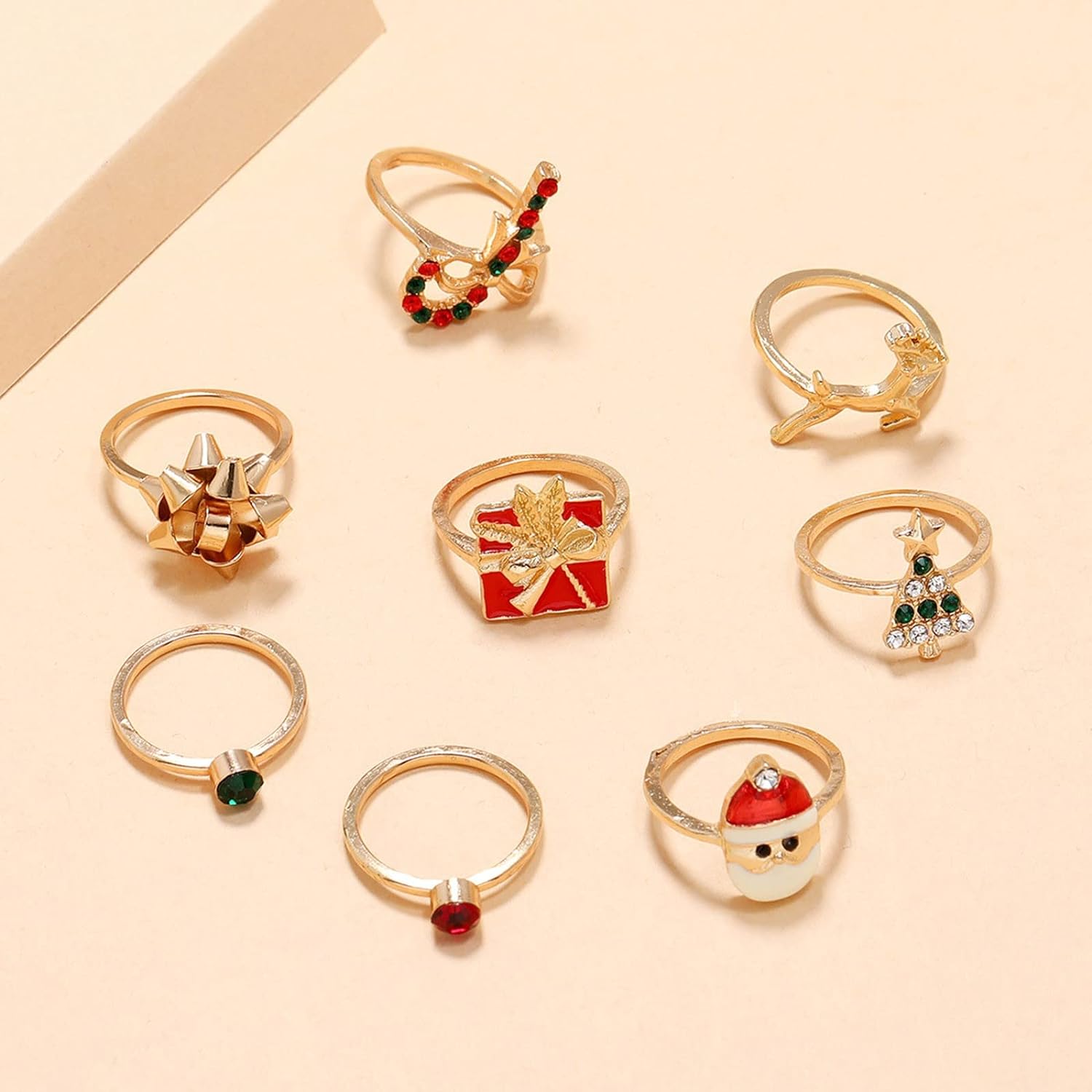 Weihnachtliche Ringe Set, goldfarben, mit Weihnachtsbaum, Rentier, Geschenk, Santa-Motiv.
