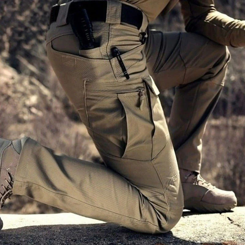 Taktische Cargohose Herren, beige, robust, Outdoor, mit Taschen, ideal für Wandern und Abenteuer.