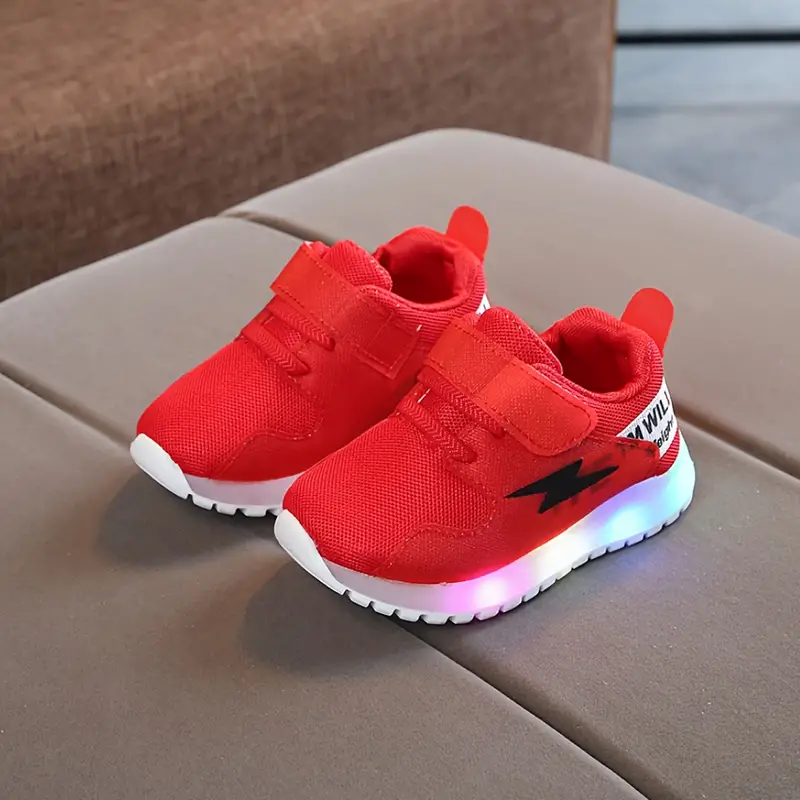 Rote LED-Kinderschuhe mit Klettverschluss, Blitzdesign, rutschfeste Sohle, bequem.
