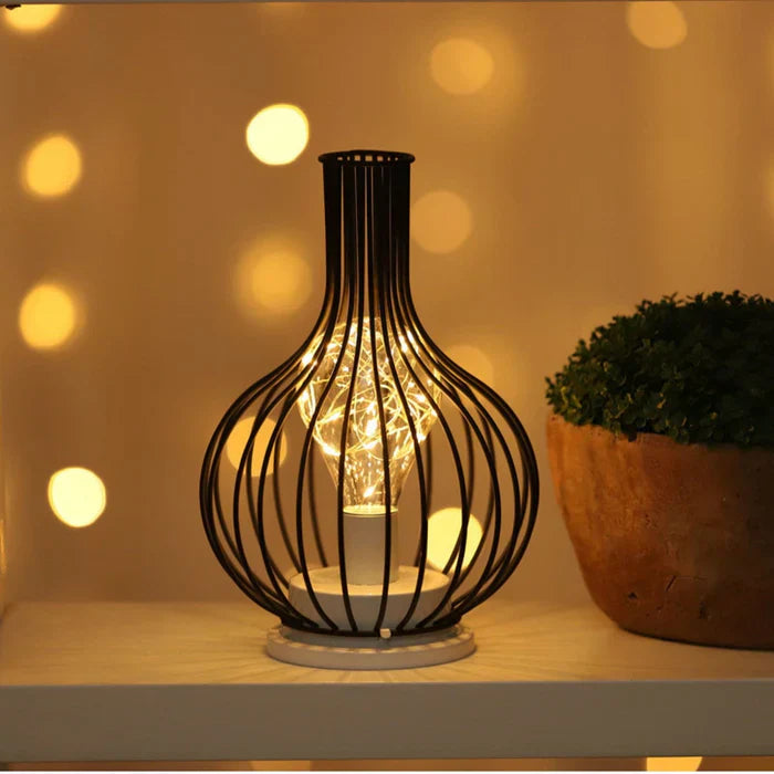 Schwarze Metall-Tischlampe mit LED-Licht, dekorative Beleuchtung, modernes Design.
