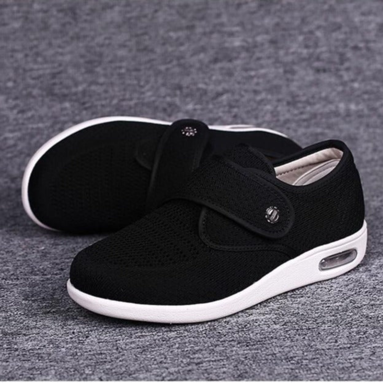 Schwarzer Sneaker mit Klettverschluss, atmungsaktiv, rutschfest, für Damen und Herren.