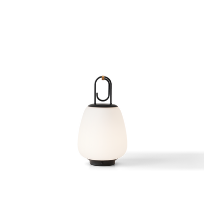 Moderne tragbare LED-Lampe, weiß, mit schwarzem Griff, für Innen- und Außenbeleuchtung.