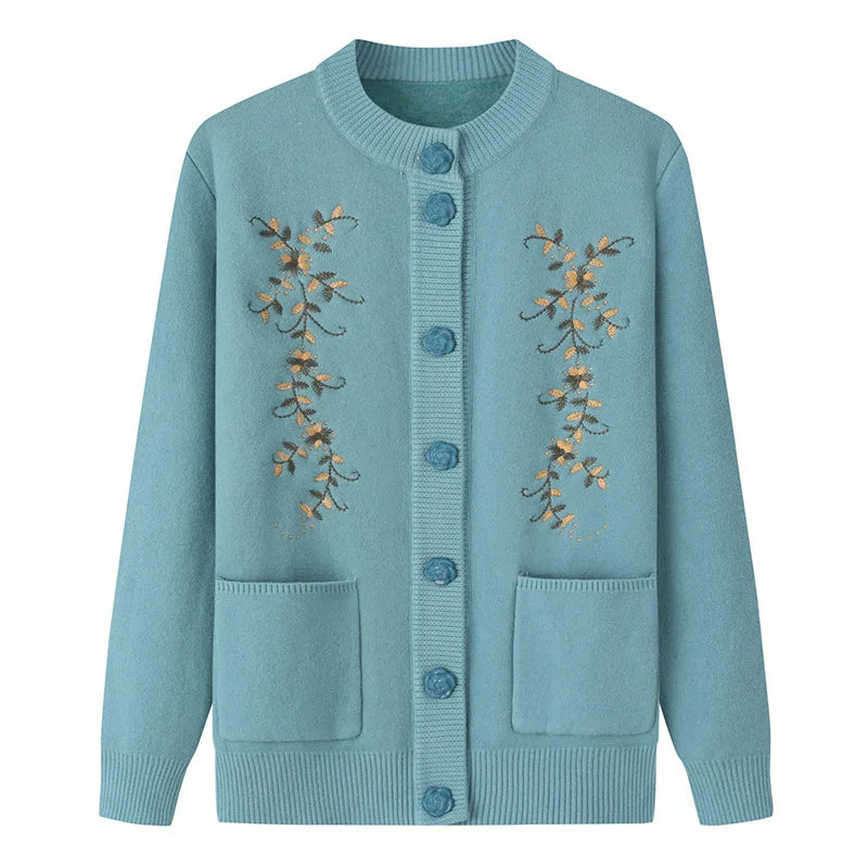 Blaue Strickjacke mit Blumenstickerei, Knöpfen und Taschen, Damenmode, Herbstbekleidung.