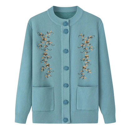 Blaue Strickjacke mit Blumenstickerei, Knöpfen und Taschen, Damenmode, Herbstbekleidung.