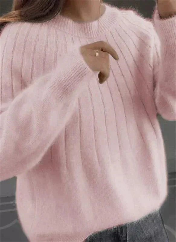 Damenpullover aus rosa Strick, weiches Material, modisch, langärmelig, Herbstmode.