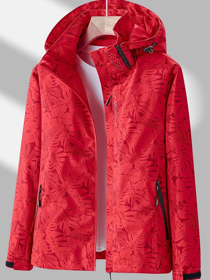 Rote Damenjacke mit Kapuze, floralem Muster, Reißverschluss, Outdoor-Bekleidung.