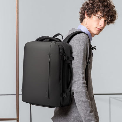 Expanderbar 26–45 L vattentät resryggsäck med laptopfack och duffelalternativ