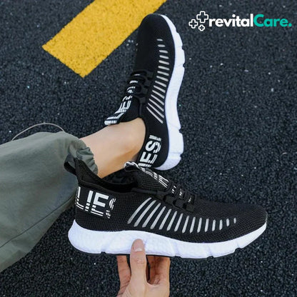 Schwarze Sportschuhe mit weißer Sohle, atmungsaktives Mesh, ideal für Laufen und Fitness.